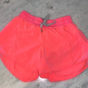 Hotty hot bright pink lululemon shorts.